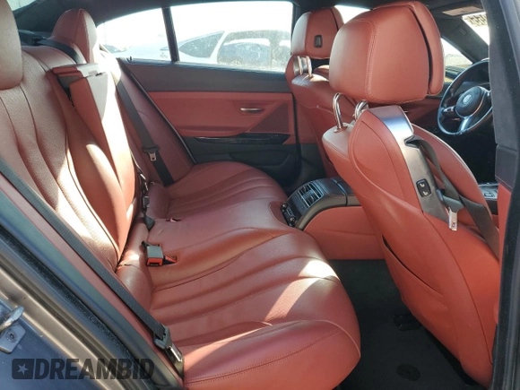 2014 BMW 6 Series 650i xDrive z VIN WBA6B4C53ED371461, wystawiony jako Copart lot #51136055 z przebiegiem 143 213 mil mil oraz Tytuł czysty. Historia ofert i sprzedaży dostępna na DreamBid. Obrazek 10.