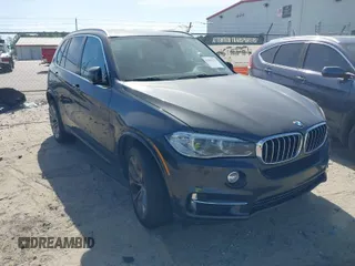 2014 BMW X5 xDrive35d with VIN 5UXKS4C57E0J93982, listed as a IAAI auction lot 42085173 with 169,908 mi miles. Bid and sale history available at carsss.com. Image 1.