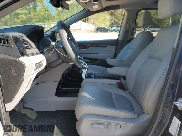 2023 Honda Odyssey Touring с VIN 5FNRL6H84PB035017, выставлен на аукционе Copart как лот 51666035 с пробегом 47 818 миль миль и Списание • Salvage title. История ставок и продаж доступна на DreamBid. Изображение 7.