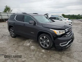2017 GMC Acadia SLT z VIN 1GKKNNLS6HZ254019, wystawiony jako Copart lot #57449415 z przebiegiem 124 442 mil mil oraz Szkoda całkowita • Salvage title. Historia ofert i sprzedaży dostępna na DreamBid. Obrazek 4.