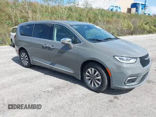 2022 Chrysler Pacifica Hybrid Limited z VIN 2C4RC1S71NR144989, wystawiony jako IAAI lot #40735375 z przebiegiem 61 361 mil mil oraz . Historia ofert i sprzedaży dostępna na DreamBid. Obrazek 1.