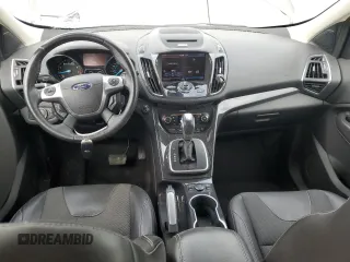 2013 Ford Escape Titanium z VIN 1FMCU0J98DUB64363, wystawiony jako Copart lot #54772925 z przebiegiem 109 956 mil mil oraz Szkody całkowita. Historia ofert i sprzedaży dostępna na DreamBid. Obrazek 8.