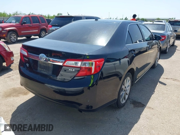 2014 Toyota Camry L with VIN 4T4BF1FK3ER413537, listed as a IAAI auction lot 42015577 with 181,592 mi miles. Bid and sale history available at carsss.com. Image 4.