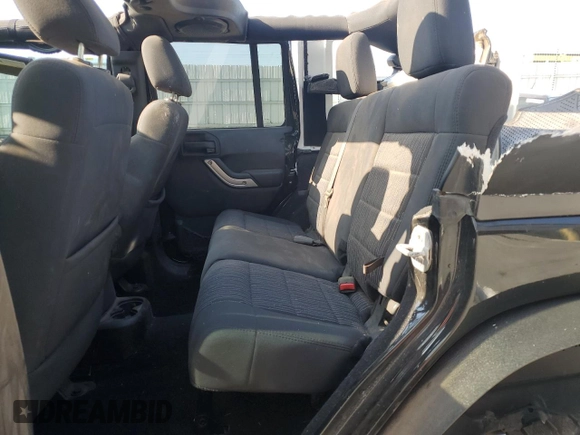 2012 Jeep Wrangler Unlimited Sahara with VIN 1C4BJWEG5CL235835, listed as a Copart auction lot 60673555 with 86,606 mi miles and Salvage title. Bid and sale history available at DreamBid. Image 11.