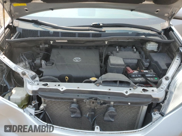 2014 Toyota Sienna L with VIN 5TDZK3DC8ES442973, listed as a Copart auction lot 59660055 with 310,496 mi miles and Salvage title. Bid and sale history available at DreamBid. Image 12.