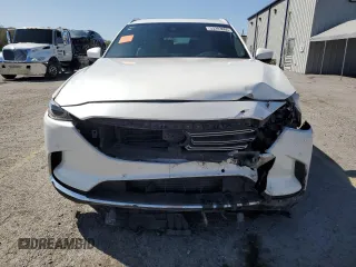 2021 Mazda CX-9 Carbon Edition с VIN JM3TCADY4M0500010, выставлен на аукционе Copart как лот 53283005 с пробегом 55 762 миль миль и Списание • Salvage title. История ставок и продаж доступна на DreamBid. Изображение 5.