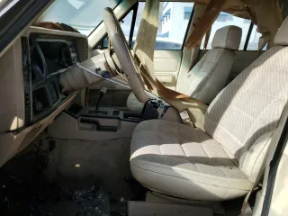 1989 Jeep Cherokee with VIN 1J4FJ38L2KL462983, listed as a Copart auction lot 48012545 with Not provided miles and Salvage title. Bid and sale history available at DreamBid. Image 7.