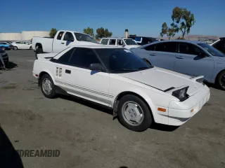 1986 Toyota MR2 z VIN JT2AW15CXG0080034, wystawiony jako Copart lot #73423944 z przebiegiem 54 316 mil mil oraz Szkody całkowita. Historia ofert i sprzedaży dostępna na DreamBid. Obrazek 4.