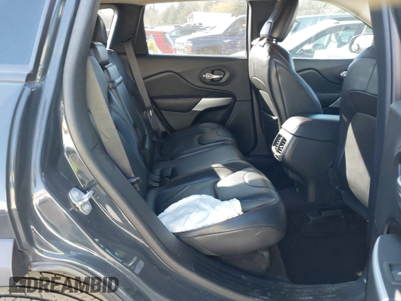 2017 Jeep Cherokee Trailhawk L Plus with VIN 1C4PJMBBXHW634944, listed as a IAAI auction lot 41022673 with 116,542 mi miles. Bid and sale history available at carsss.com. Image 8.