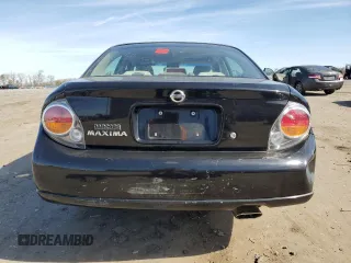 2002 Nissan Maxima GXE z VIN JN1DA31D92T409717, wystawiony jako Copart lot #49413035 z przebiegiem 90 697 mil mil oraz Szkoda całkowita • Salvage title. Historia ofert i sprzedaży dostępna na DreamBid. Obrazek 6.