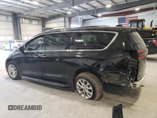 2021 Chrysler Pacifica Touring L with VIN 2C4RC3BG4MR573571, listed as a Copart auction lot 89388215 with 50,969 mi miles and Salvage title. Bid and sale history available at DreamBid. Image 2.