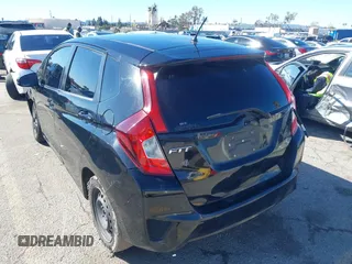 2015 Honda Fit LX with VIN 3HGGK5H56FM706547, listed as a IAAI auction lot 41745026 with 252,238 mi miles. Bid and sale history available at carsss.com. Image 3.