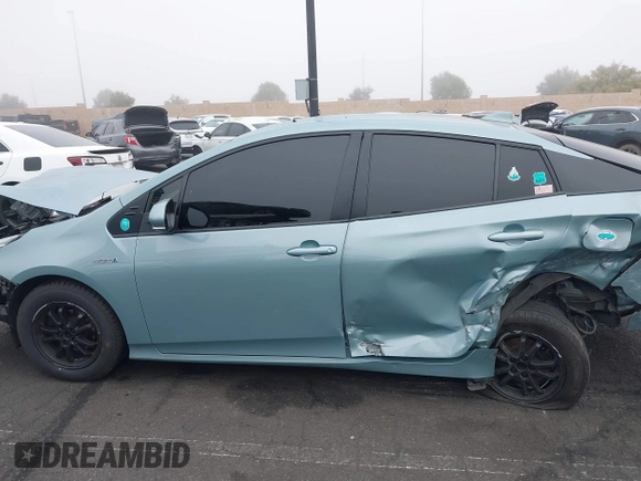 2022 Toyota Prius L Eco with VIN JTDKAMFU9N3186859, listed as a IAAI auction lot 41486941 with 122,665 mi miles and . Bid and sale history available at DreamBid. Image 14.
