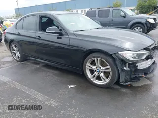 2014 BMW 3 Series 328i with VIN WBA3A5G58ENN66293, listed as a IAAI auction lot 42106001 with 106,108 mi miles and . Bid and sale history available at DreamBid. Image 1.