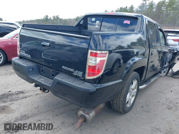 2013 Honda Ridgeline RTL with VIN 5FPYK1F50DB010368, listed as a IAAI auction lot 42048645 with 131,399 mi miles and . Bid and sale history available at DreamBid. Image 4.