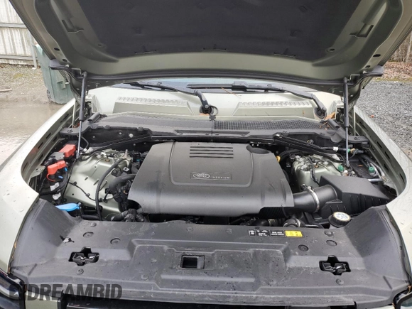 2024 Land Rover Defender S with VIN SALEJ7EX9R2343479, listed as a Copart auction lot 84972984 with 3,124 mi miles and Salvage title. Bid and sale history available at DreamBid. Image 12.