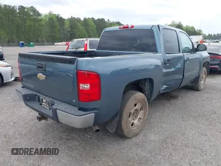 2010 Chevrolet Silverado 1500 LT with VIN 3GCRCSE01AG151249, listed as a IAAI auction lot 41952263 with 255,140 mi miles and . Bid and sale history available at DreamBid. Image 4.