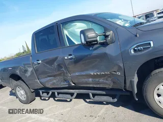 2021 Nissan Titan SV with VIN 1N6AA1FA6MN529806, listed as a IAAI auction lot 41859992 with 50,729 mi miles and . Bid and sale history available at DreamBid. Image 13.