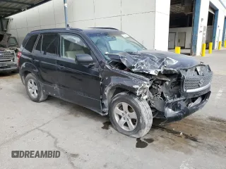 2009 Suzuki Grand Vitara with VIN JS3TE044094100649, listed as a Copart auction lot 52033855 with 137,460 mi miles and Salvage title. Bid and sale history available at DreamBid. Image 4.
