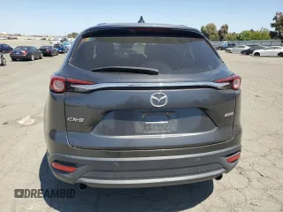 2016 Mazda CX-9 Touring z VIN JM3TCACY9G0123650, wystawiony jako Copart lot #58312625 z przebiegiem 121 408 mil mil oraz Czysty tytuł • Clean title. Historia ofert i sprzedaży dostępna na DreamBid. Obrazek 6.