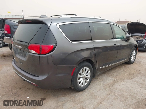 2018 Chrysler Pacifica Touring L with VIN 2C4RC1BG2JR116273, listed as a IAAI auction lot 41922292 with 125,159 mi miles and . Bid and sale history available at DreamBid. Image 4.