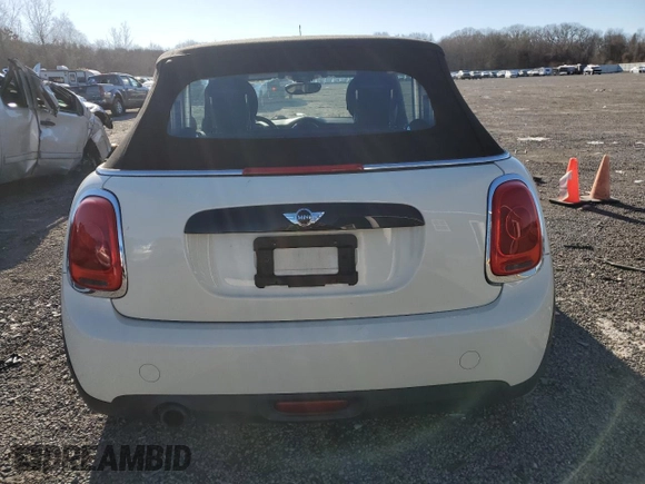 2016 MINI Convertible z VIN WMWWG5C5XG3C19552, wystawiony jako Copart lot #86790134 z przebiegiem 112 494 mil mil oraz Szkoda całkowita • Salvage title. Historia ofert i sprzedaży dostępna na DreamBid. Obrazek 6.