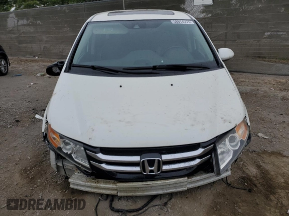 2014 Honda Odyssey Touring z VIN 5FNRL5H91EB089813, wystawiony jako Copart lot #58674275 z przebiegiem Nie podano mil oraz Szkoda całkowita • Salvage title. Historia ofert i sprzedaży dostępna na DreamBid. Obrazek 5.