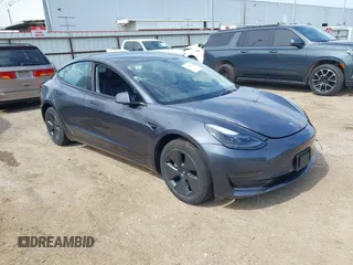 2023 Tesla Model 3 z VIN 5YJ3E1EAXPF661052, wystawiony jako IAAI lot #42347916 z przebiegiem 26 757 mil mil oraz . Historia ofert i sprzedaży dostępna na DreamBid. Obrazek 1.