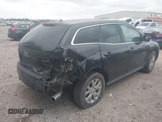 2009 Mazda CX-7 Sport z VIN JM3ER29L790220891, wystawiony jako IAAI lot #42039399 z przebiegiem 128 156 mil mil oraz . Historia ofert i sprzedaży dostępna na DreamBid. Obrazek 4.
