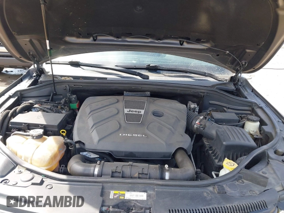 2014 Jeep Grand Cherokee Summit with VIN 1C4RJFJM5EC377129, listed as a IAAI auction lot 41763932 with 187,561 mi miles and . Bid and sale history available at DreamBid. Image 10.