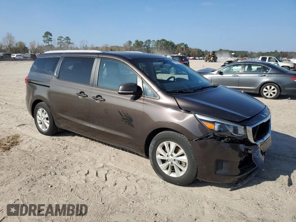 2016 Kia Sedona LX with VIN KNDMB5C11G6090781, listed as a Copart auction lot 41457025 with 131,501 mi miles and Salvage Title. Bid and sale history available at carsss.com. Image 4.