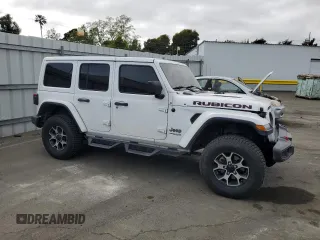 2019 Jeep Wrangler Unlimited Rubicon with VIN 1C4HJXFG6KW642011, listed as a Copart auction lot 53132185 with 67,435 mi miles and Salvage title. Bid and sale history available at DreamBid. Image 4.