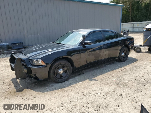 2013 Dodge Charger Police with VIN 2C3CDXAT6DH586213, listed as a Copart auction lot 62193175 with 197,497 mi miles and Clean title. Bid and sale history available at DreamBid. Image 1.