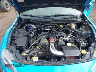 2014 Scion FR-S z VIN JF1ZNAA10E9701121, wystawiony jako IAAI lot #42128884 z przebiegiem 133 634 mil mil oraz . Historia ofert i sprzedaży dostępna na DreamBid. Obrazek 10.