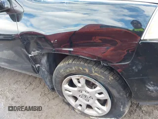 2004 Acura MDX Touring Pkg w/Navigation with VIN 2HNYD18864H519475, listed as a IAAI auction lot 41450182 with 203,389 mi miles. Bid and sale history available at carsss.com. Image 6.