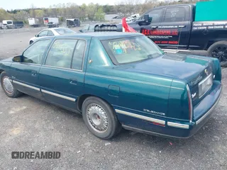 1999 Cadillac DeVille DHS z VIN 1G6KE54Y9XU766791, wystawiony jako IAAI lot #42005553 z przebiegiem 140 515 mil mil oraz . Historia ofert i sprzedaży dostępna na DreamBid. Obrazek 3.