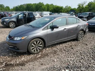2015 Honda Civic EX-L z VIN 19XFB2F99FE219139, wystawiony jako Copart lot #59377955 z przebiegiem 62 095 mil mil oraz Szkoda całkowita • Salvage title. Historia ofert i sprzedaży dostępna na DreamBid. Obrazek 1.