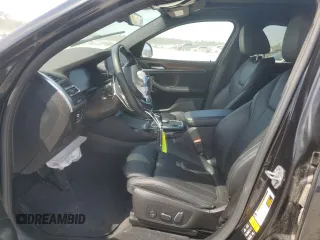 2024 BMW X4 xDrive30i with VIN 5UX33DT03R9U08801, listed as a Copart auction lot 52982635 with 25,238 mi miles and Salvage Title. Bid and sale history available at carsss.com. Image 7.