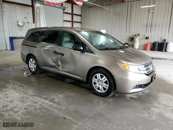 2013 Honda Odyssey LX with VIN 5FNRL5H27DB076212, listed as a Copart auction lot 52856615 with 123,096 mi miles and Salvage Title. Bid and sale history available at carsss.com. Image 4.