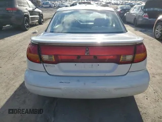 1999 Saturn SC with VIN 1G8ZR1275XZ375833, listed as a Copart auction lot 87960885 with 97,697 mi miles and Salvage Title. Bid and sale history available at carsss.com. Image 6.