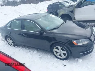 2013 Volkswagen Passat SE z VIN 1VWBP7A39DC047714, wystawiony jako IAAI lot #41577301 z przebiegiem 162 164 mil mil oraz . Historia ofert i sprzedaży dostępna na DreamBid. Obrazek 13.