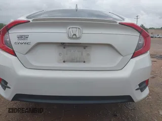 2017 Honda Civic EX-L with VIN 2HGFC1F72HH658763, listed as a IAAI auction lot 41972317 with 166,168 mi miles and . Bid and sale history available at DreamBid. Image 17.