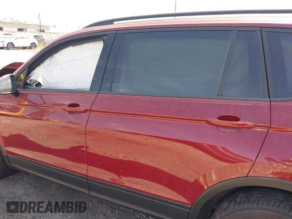2018 Volkswagen Tiguan S with VIN 3VV1B7AX3JM128705, listed as a IAAI auction lot 42110808 with 60,589 mi miles and . Bid and sale history available at DreamBid. Image 14.