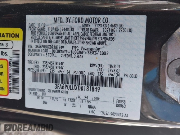 2013 Ford Fusion SE Hybrid z VIN 3FA6P0LUXDR181849, wystawiony jako IAAI lot #41949276 z przebiegiem 112 688 mil mil oraz . Historia ofert i sprzedaży dostępna na DreamBid. Obrazek 9.