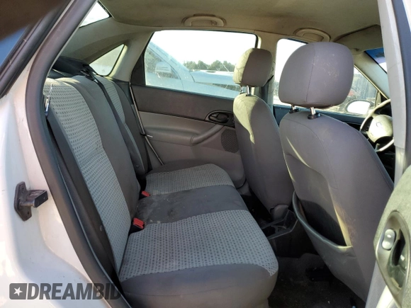 2007 Ford Focus S with VIN 1FAFP34N47W243028, listed as a Copart auction lot 55147695 with 218,672 mi miles and Salvage title. Bid and sale history available at DreamBid. Image 10.