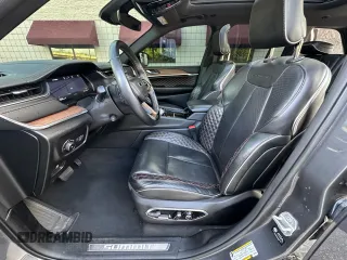 2023 Jeep Grand Cherokee Summit with VIN 1C4RJHEG2P8882566, listed as a Copart auction lot 65095905 with 59,970 mi miles and Salvage title. Bid and sale history available at DreamBid. Image 12.
