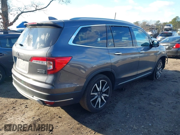 2022 Honda Pilot Touring 7-Passenger with VIN 5FNYF6H62NB010647, listed as a IAAI auction lot 41199560 with 102,066 mi miles. Bid and sale history available at carsss.com. Image 4.