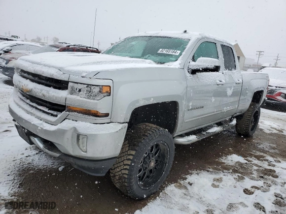 2016 Chevrolet Silverado 1500 LT with VIN 1GCVKREC3GZ199767, listed as a Copart auction lot 82165184 with 136,667 mi miles and Salvage Title. Bid and sale history available at carsss.com. Image 1.