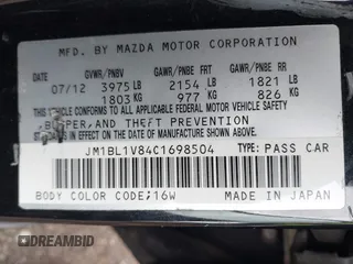2012 Mazda Mazda3 i Touring with VIN JM1BL1V84C1698504, listed as a IAAI auction lot 42039726 with Not Provided miles. Bid and sale history available at carsss.com. Image 9.