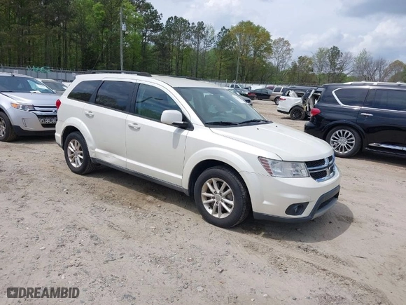 2013 Dodge Journey SXT with VIN 3C4PDCBG2DT727017, listed as a IAAI auction lot 41969122 with 110,016 mi miles. Bid and sale history available at carsss.com. Image 1.